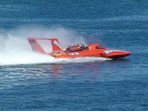 Speedboat flying down the water