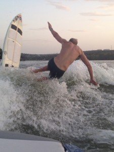 man falling down in the lake