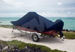 navy cover on red boat