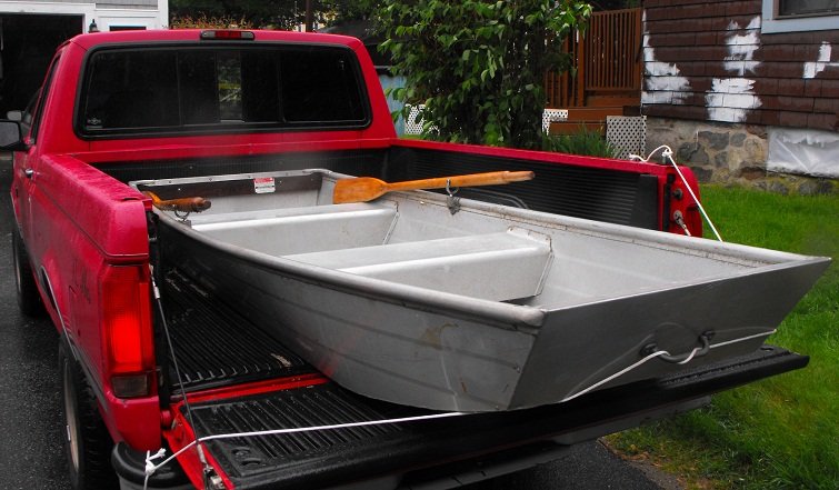 John boat in back of truck