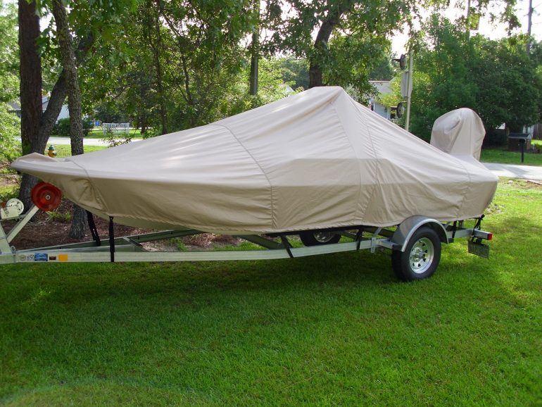 Carolina Skiff JV 17 CC with beige Carver boat cover